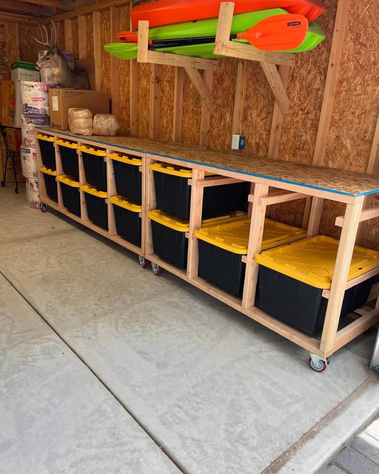 Rolling garage storage bench with bin cubbies, built by Central Jersey Home Services LLC